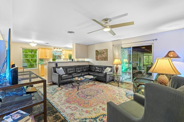 8017 Gault St, Austin, TX 78757 - living room featuring ceiling fan and wood finished floors
