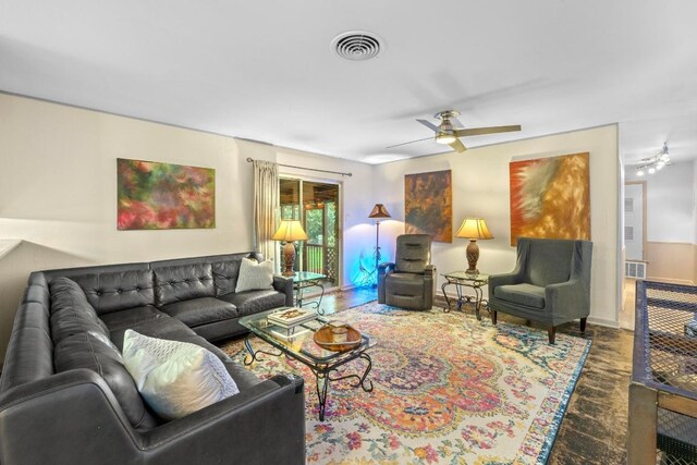 8017 Gault St, Austin, TX 78757 - living room featuring a ceiling fan and wood finished floors