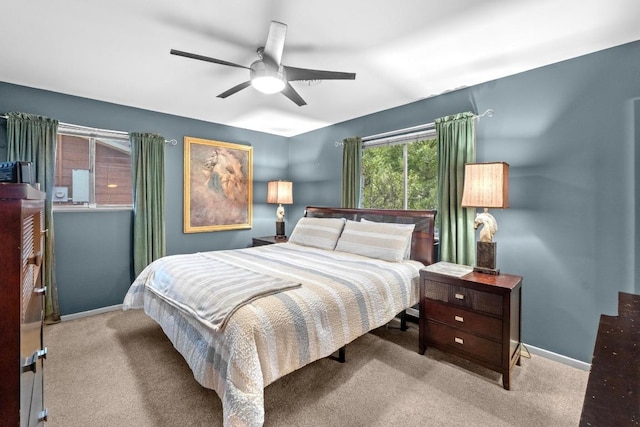 8017 Gault St, Austin, TX 78757 - bedroom featuring baseboards, carpet floors, and a ceiling fan