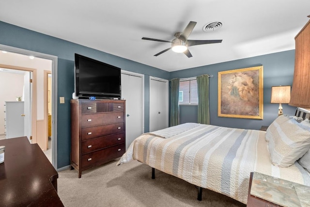 8017 Gault St, Austin, TX 78757 - bedroom with two closets and a ceiling fan