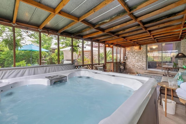 8017 Gault St, Austin, TX 78757 - unfurnished sunroom featuring a jacuzzi and healthy amount of natural light