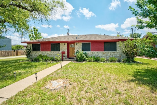 8017 Gault St, Austin, TX 78757 - ranch-style home featuring stone siding and roof with shingles