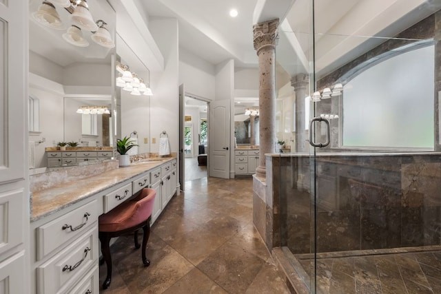 401 Brooks Hollow Rd, Lakeway, TX 78734 - bathroom with vanity, a shower stall, recessed lighting, and decorative columns