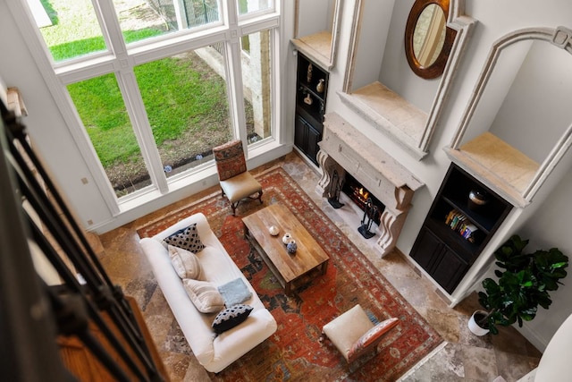 401 Brooks Hollow Rd, Lakeway, TX 78734 - living room with plenty of natural light and a fireplace