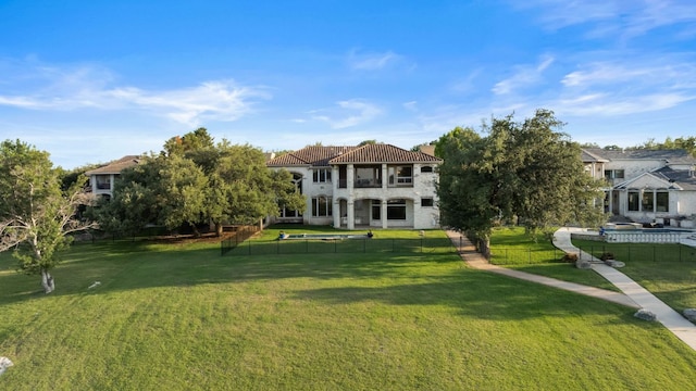 401 Brooks Hollow Rd, Lakeway, TX 78734 - back of house featuring a balcony, a chimney, and a tiled roof