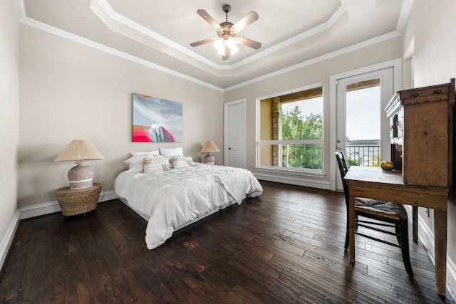 401 Brooks Hollow Rd, Lakeway, TX 78734 - bedroom featuring a raised ceiling, access to exterior, wood-type flooring, ornamental molding, and baseboards