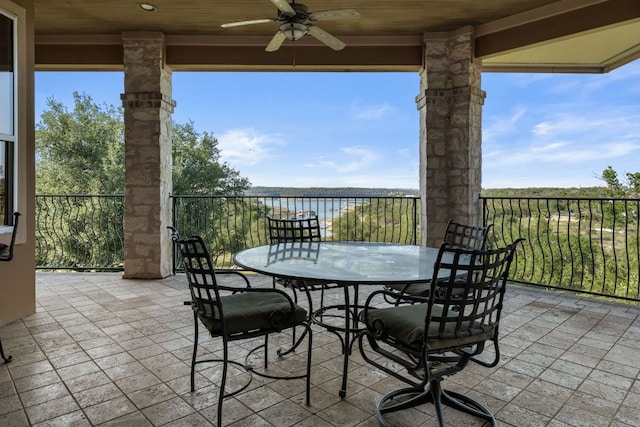 401 Brooks Hollow Rd, Lakeway, TX 78734 - view of patio with a ceiling fan, a water view, and outdoor dining space