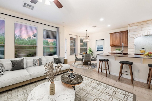199 Limestone Trl, Austin, TX 78737 - living room featuring ceiling fan, recessed lighting, and light tile patterned floors