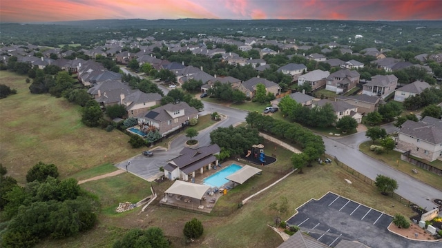 199 Limestone Trl, Austin, TX 78737 - aerial view at dusk of view of pool and a residential view
