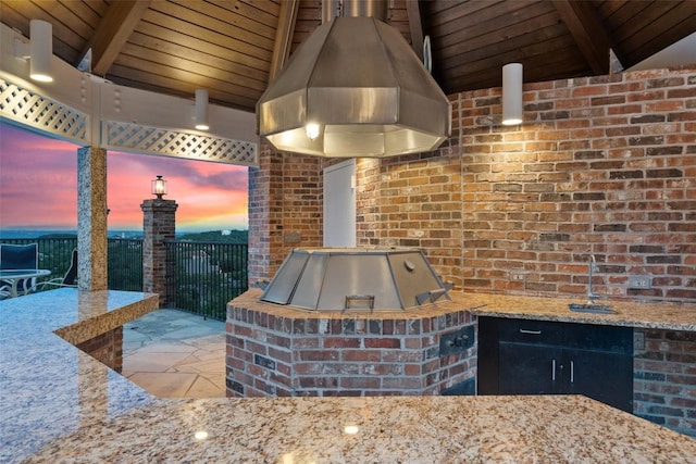 12 Hedge Ln, Austin, TX 78746 - view of patio / terrace with exterior kitchen, a grill, and a sink
