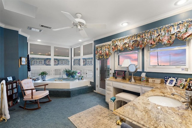 12 Hedge Ln, Austin, TX 78746 - bathroom featuring crown molding, a ceiling fan, a bath, vanity, and recessed lighting