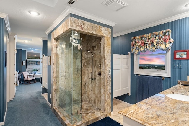 12 Hedge Ln, Austin, TX 78746 - full bathroom featuring a stall shower, crown molding, a sink, and baseboards