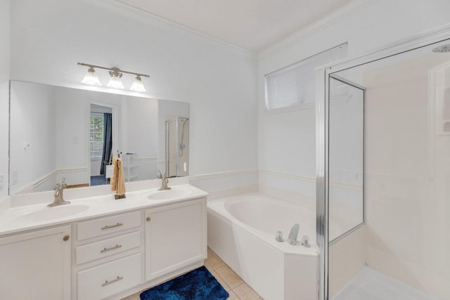 full bathroom featuring a stall shower, ornamental molding, a bath, double vanity, and tile patterned flooring