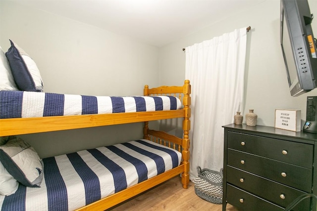 104 Cove E Unit 103, Horseshoe Bay, TX 78657 - bedroom with wood finished floors