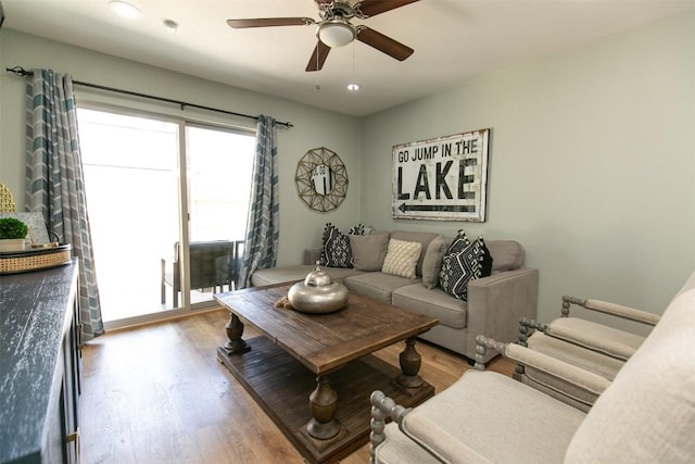 104 Cove E Unit 103, Horseshoe Bay, TX 78657 - living room featuring wood finished floors and ceiling fan