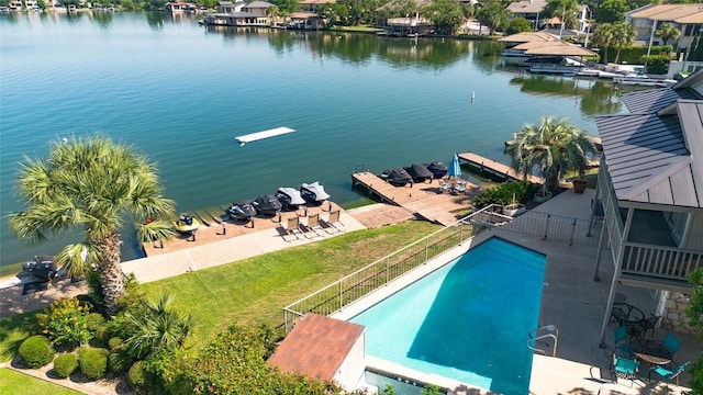 104 Cove E Unit 103, Horseshoe Bay, TX 78657 - bird's eye view of a large body of water and a pool area