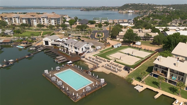 104 Cove E Unit 103, Horseshoe Bay, TX 78657 - aerial view of property and surrounding area with a nearby body of water and a pool area