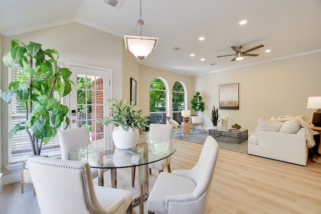 dining area featuring recessed lighting, light wood-style flooring, a ceiling fan, and ornamental molding