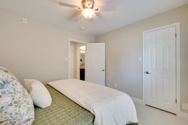 bedroom with light carpet, ceiling fan, and baseboards