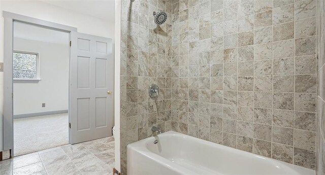13918 Hummingbird Ln, Austin, TX 78732 - bathroom featuring tub / shower combination and baseboards