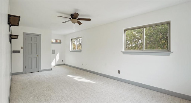 13918 Hummingbird Ln, Austin, TX 78732 - unfurnished room featuring carpet, baseboards, and ceiling fan
