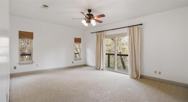 13918 Hummingbird Ln, Austin, TX 78732 - carpeted empty room with a ceiling fan and baseboards