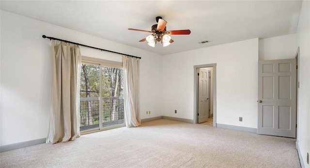 13918 Hummingbird Ln, Austin, TX 78732 - spare room featuring ceiling fan, light carpet, and baseboards