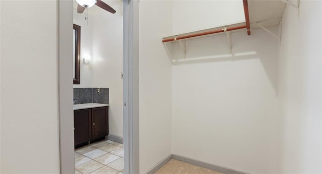 13918 Hummingbird Ln, Austin, TX 78732 - spacious closet with ceiling fan