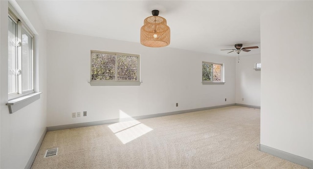 13918 Hummingbird Ln, Austin, TX 78732 - carpeted empty room featuring baseboards and a ceiling fan
