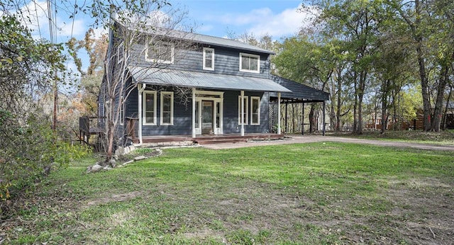 13918 Hummingbird Ln, Austin, TX 78732 - view of front facade featuring a porch, a front yard, metal roof, and a carport