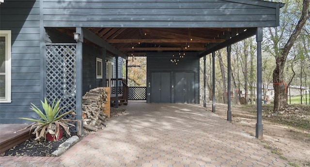 13918 Hummingbird Ln, Austin, TX 78732 - view of parking with a carport