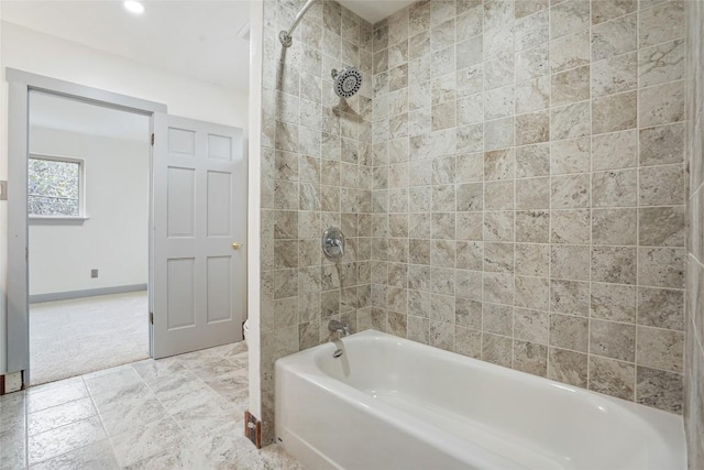 13918 Hummingbird Ln, Austin, TX 78732 - full bathroom featuring shower / bath combination and baseboards