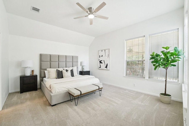 7403 Ponoma Trl, Austin, TX 78749 - bedroom featuring light colored carpet, baseboards, vaulted ceiling, and ceiling fan