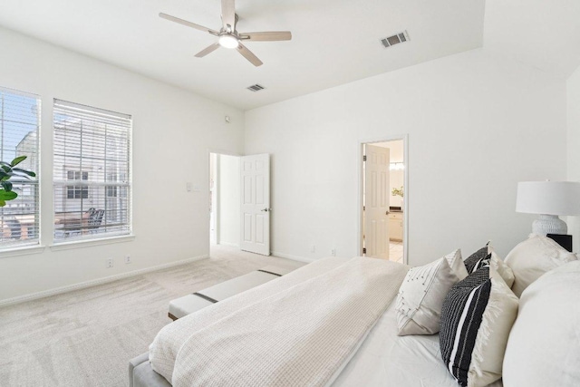 7403 Ponoma Trl, Austin, TX 78749 - bedroom featuring light colored carpet, baseboards, connected bathroom, and ceiling fan