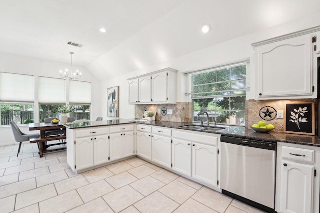 7403 Ponoma Trl, Austin, TX 78749 - kitchen with dishwasher, a sink, a peninsula, healthy amount of natural light, and lofted ceiling