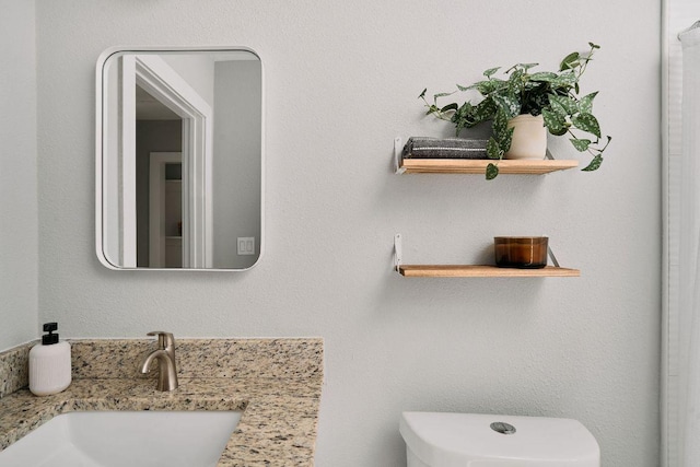 bathroom featuring a sink and toilet