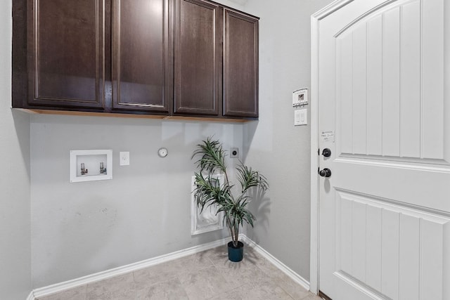 1180 Verna Brooks Way, Kyle, TX 78640 - laundry room with baseboards, cabinet space, hookup for an electric dryer, hookup for a washing machine, and gas dryer hookup