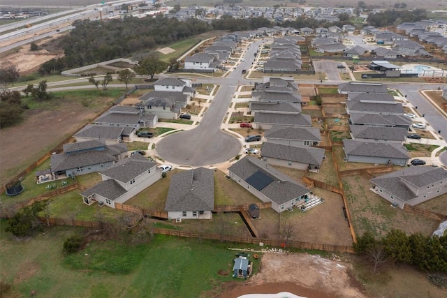 aerial overview of property's location with nearby suburban area