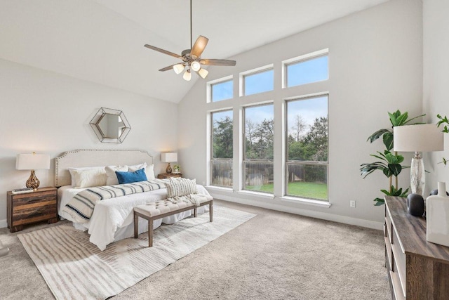 bedroom with carpet, high vaulted ceiling, baseboards, and ceiling fan