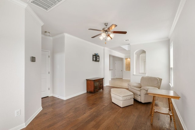 9617 Solana Vista Loop Unit A, Austin, TX 78750 - living room featuring wood finished floors, a ceiling fan, baseboards, and crown molding