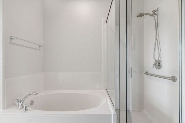 9617 Solana Vista Loop Unit A, Austin, TX 78750 - bathroom with a stall shower and a bath