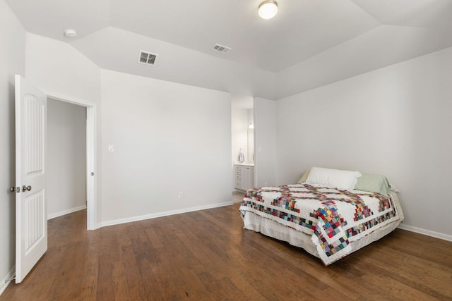 9617 Solana Vista Loop Unit A, Austin, TX 78750 - bedroom with lofted ceiling, wood finished floors, baseboards, and ensuite bath