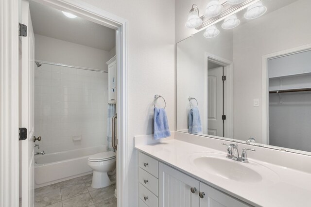 9617 Solana Vista Loop Unit A, Austin, TX 78750 - bathroom featuring vanity, toilet, and bathtub / shower combination