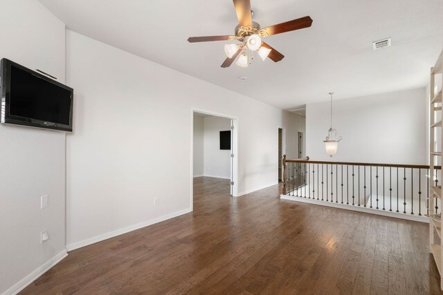 9617 Solana Vista Loop Unit A, Austin, TX 78750 - spare room featuring ceiling fan, wood finished floors, and baseboards