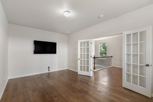 9617 Solana Vista Loop Unit A, Austin, TX 78750 - unfurnished room with wood finished floors, french doors, baseboards, and a smoke detector
