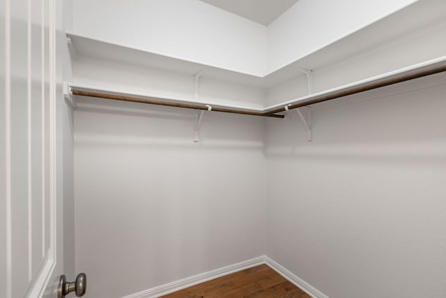 9617 Solana Vista Loop Unit A, Austin, TX 78750 - spacious closet with dark wood-style flooring
