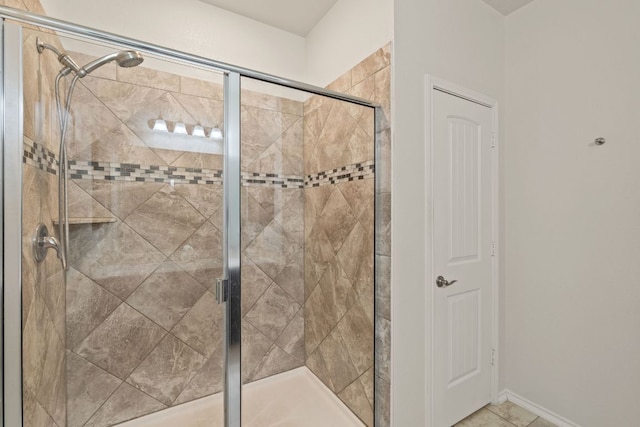 bathroom with a stall shower