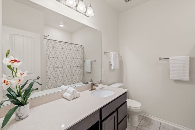bathroom featuring tile patterned floors, toilet, vanity, a shower with shower curtain, and baseboards