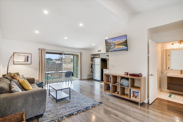 1304 Mariposa Dr Unit 214, Austin, TX 78704 - living room with wood finished floors and recessed lighting