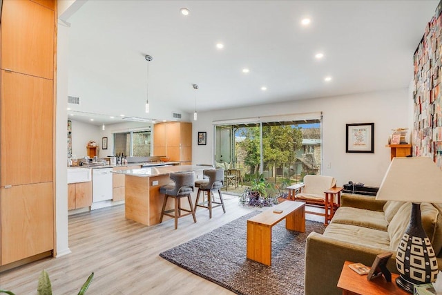 1304 Mariposa Dr Unit 215, Austin, TX 78704 - living room featuring recessed lighting and light wood-style flooring